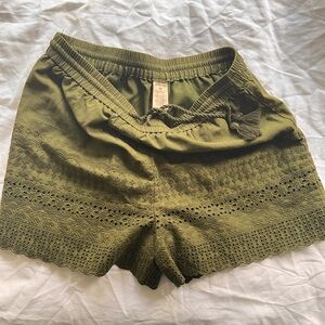 Women’s size 10, Faded Glory, olive green eyelet shorts. Inseam is about 3.5”.